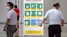 A sign for COVID-19 countermeasures at Main Press Centre for the Tokyo Olympic Games.