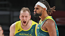 Patty Mills #5 and Joe Ingles #7 of Team Australia react against Team Slovenia 