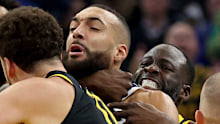 Draymond Green in an altercation with Minnesota Timberwolves center Rudy Gobert.