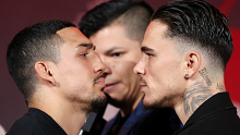 Teofimo Lopez and George Kambosos Jr face off during a press conference.