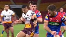 Newcastle's Bradman Best holding back Brisbane's Jamayne Isaako as Lachlan Fitzgibbon of the Knights tears through to score a controversial try.