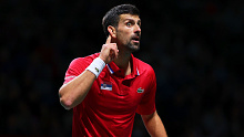 Novak Djokovic taunts the British fans during Serbia's Davis Cup tie against Great Britain