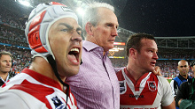 Wayne Bennett celebrates with Jamie Soward and Dean Young after the Dragons' 2010 NRL Premiership. (Getty)
