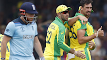 Eoin Morgan (L) after being dismissed by Mitchell Starc.