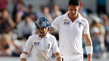 James Taylor of England is consoled by Kevin Pietersen.