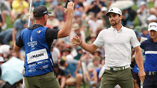 Joaquin Niemann of Chile celebrates winning the Men's ISPS HANDA Australian Open with his caddie during the 2nd playoff hole against Rikuya Hoshino of Japan in the ISPS HANDA Australian Open at The Australian Golf Course on December 03, 2023 in Sydney, Australia. (Photo by Matt King/Getty Images)