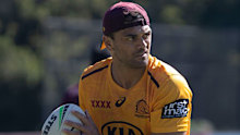 Karmichael Hunt shapes to pass the footy at a Broncos training session.