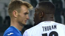 Marcus Thuram spits in the face of Stefan Posch.