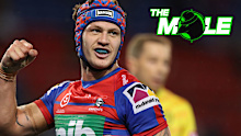 Newcastle Knights star Kalyn Ponga and referee Ben Cummins during a spiteful clash with Cronulla.