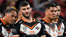 Wests Tigers players cutting dejected figures.