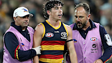 A dazed Ned McHenry of the Crows taken from the oval 