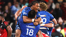 The Auckland Blues celebrate a Super Rugby Pacific win over the Crusaders.