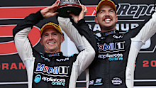 Lee Holdsworth and Chaz Mostert celebrate their Bathurst 1000 win.