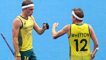  Tim Howard and Jacob Thomas Whetton of Team Australia fist bump during the Men's Preliminary Pool A match between Australia and Argentina on day four of the Tokyo 2020 Olympic Games at Oi Hockey Stadium on July 27, 2021 in Tokyo, Japan. (Photo by Francois Nel/Getty Images)
