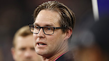 Carlton coach David Teague addresses his team.