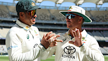 Usman Khawaja (left) and David Warner.