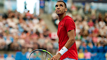 A dejected Felix Auger-Aliassime reacts during his shock defeat to Zizou Bergs at the United Cup.