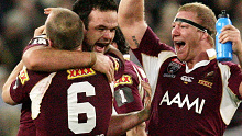 Nate Myles (C) celebrates with Darren Lockyer and Michael Crocker as Queensland wrap-up the 2009 Origin series in game two.