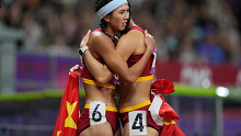 China's Lin Yuwei, left, hugs compatriot Wu Yanni at the 2023 Asian Games.
