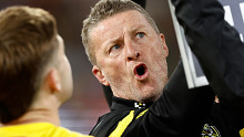Damien Hardwick pictured giving his players instructions during the round 10 loss to Essendon, his final game as Richmond coach