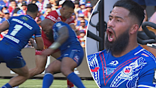 Payne Haas reacts to Junior Paulo's hit. 