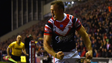 Brett Morris celebrates a try against Wigan in the World Club Challenge.