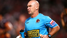 Broncos icon Allan Langer running water during a Brisbane NRL match.