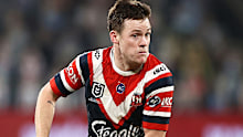 Luke Keary of the Roosters runs the ball 