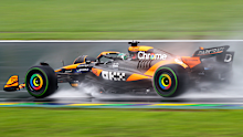 Oscar Piastri navigates the rain-soaked track during the 2024 Brazilian Grand Prix.