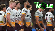 Broncos players look dejected as they lose the 2023 grand final to the Panthers.