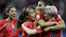 Alex Morgan (2nd right) celebrates her fifth goal vs Thailand; USA's 12th.