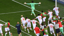 Switzerland's goalkeeper Yann Sommer reacts after saving a shot by France's Kylian Mbappe in the penalty shootout.