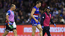 Morris limped off the field with the assistance of the Bulldogs' doctors in the third quarter and did not return