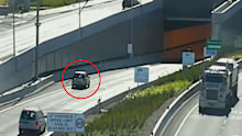 CCTV, exclusive to 9News, shows a Mazda hatchback driver pull up shy of the tunnel entrance at Parramatta Road, Ashfield and awkwardly reverse out for at least 30 seconds.