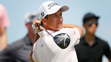 Adam Scott drives during the final round of the Northern Trust event.