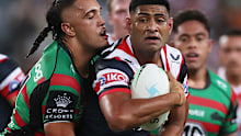 Daniel Tupou of the Roosters is tackled during a match against Souths earlier this year.