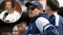 A heartbroken Tom Stewart can only look on as his teammates prepare for the 2025 AFL grand final.