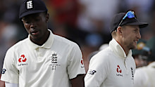 Jofra Archer and Joe Root during Australia's second innings at Old Trafford.