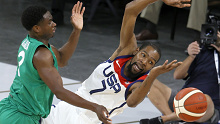 Caleb Agada of Nigeria fouls Kevin Durant of the United States.