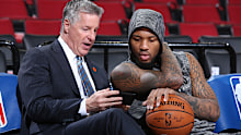 Neil Olshey talks with Portland superstar Damian Lillard 