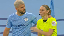 Sergio Aguero grabs a female assistant referee