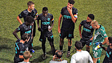 San Diego Loyal players meet at half-time