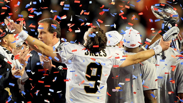 MIAMI GARDENS, FL - FEBRUARY 07: Quarterback Drew Brees #9 of the New Orleans Saints celebrates after his team defeated the Indianapolis Colts during Super Bowl XLIV on February 7, 2010 at Sun Life Stadium in Miami Gardens, Florida. (Photo by Jed Jacobsohn/Getty Images)