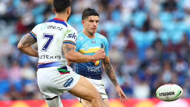 Jayden Campbell of the Titans kicks during the round 16 NRL match between Gold Coast Titans and New Zealand Warriors at Cbus Super Stadium, on June 22, 2024, in Gold Coast, Australia.