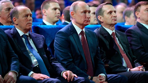 President Vladimir Putin, centre, Federal Security Service (FSB) Director Alexander Bortnikov, left, and Sergei Naryshkin, head of the Russian Foreign Intelligence Service, right, were at a meeting when the shooting occurred.
