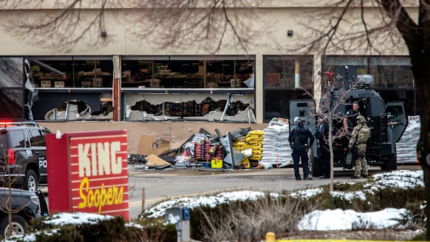 Tactical police units respond to the Boulder grocery store.