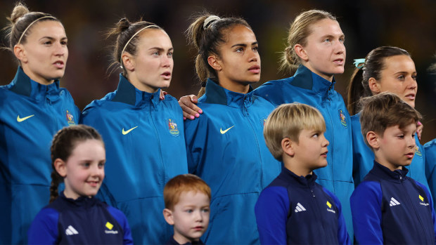 From left: Steph Catley, Caitlin Foord, Mary Fowler, Clare Hunt and Hayley Raso singing the Australian national anthem during the 2023 World Cup.