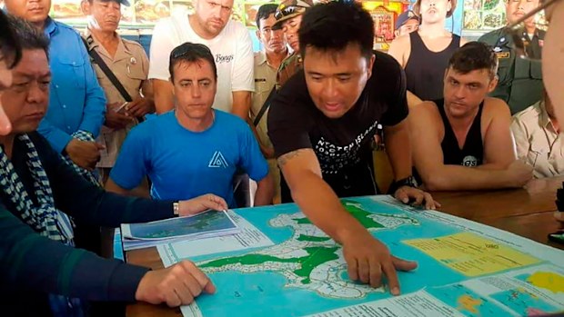 Officers show a map of Koh Rong where British national Amelia Bambridge went missing.
