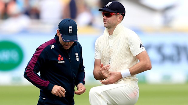 Jimmy Anderson gets treatment during day one of the first Ashes Test