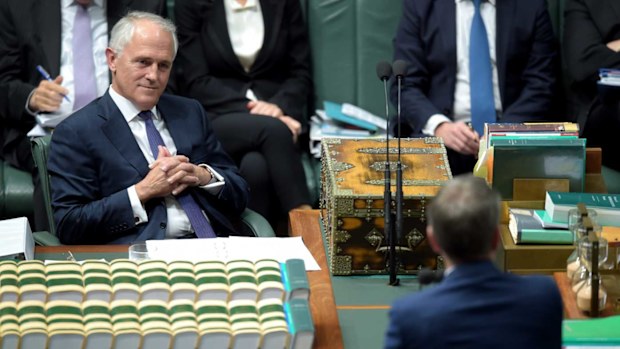 Malcolm Turnbull listens to Bill Shorten in Parliament. (AAP)